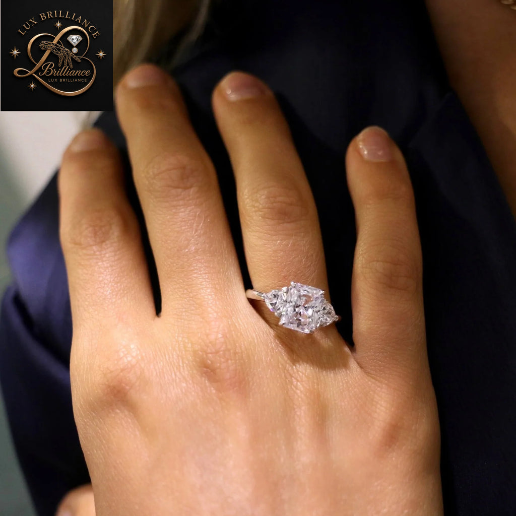 Unique Radiant Cut Diamond Three Stone Engagement Ring with Brilliant Cut Trapezoid Side Stones | 18K White Gold Ring