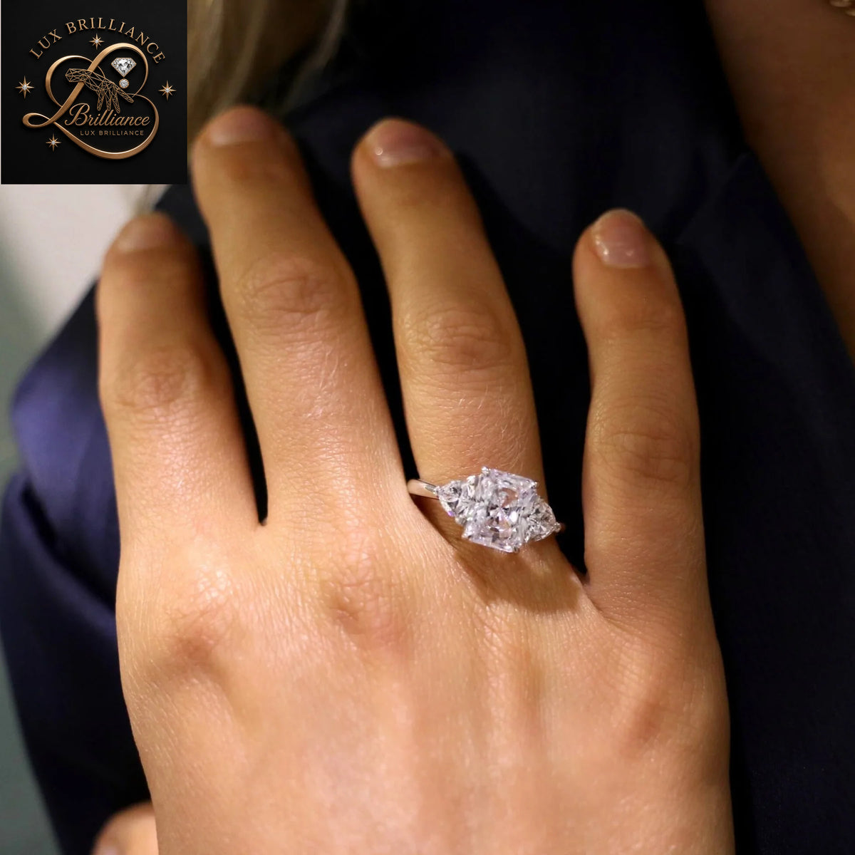 Unique Radiant Cut Diamond Three Stone Engagement Ring with Brilliant Cut Trapezoid Side Stones | 18K White Gold Ring