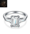 Three Stone Emerald Diamond Engagement Ring | Side Stone Tapered Baguettes Ring