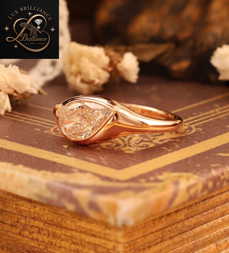 Modern Pear Cut Diamond Flush Bezel Ring in 18K Rose Gold | Anniversary Diamond Ring Gift