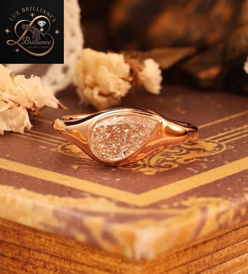 Modern Pear Cut Diamond Flush Bezel Ring in 18K Rose Gold | Anniversary Diamond Ring Gift