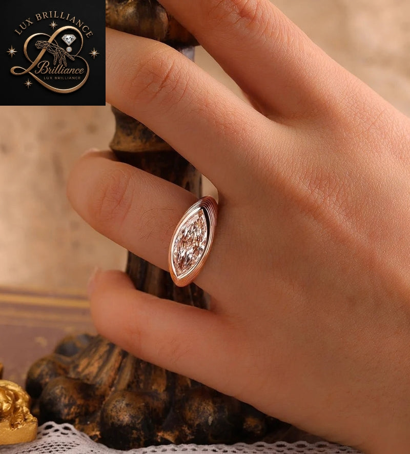Rose Gold Fluted Ribbed Marquise Cut Diamond Bezel Solitaire Ring