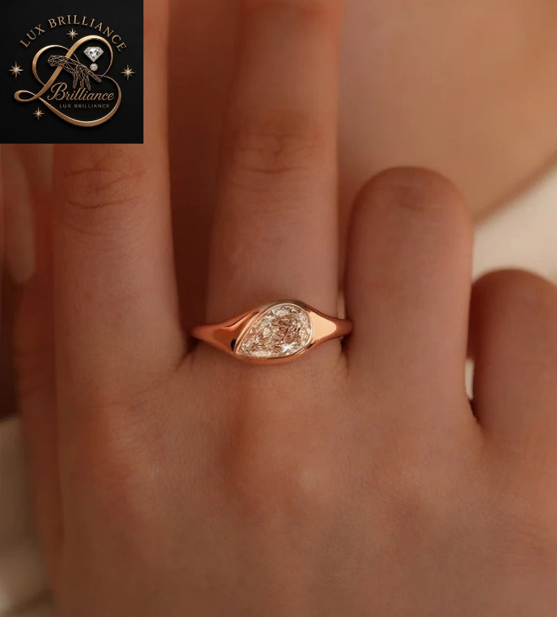 Modern Pear Cut Diamond Flush Bezel Ring in 18K Rose Gold | Anniversary Diamond Ring Gift