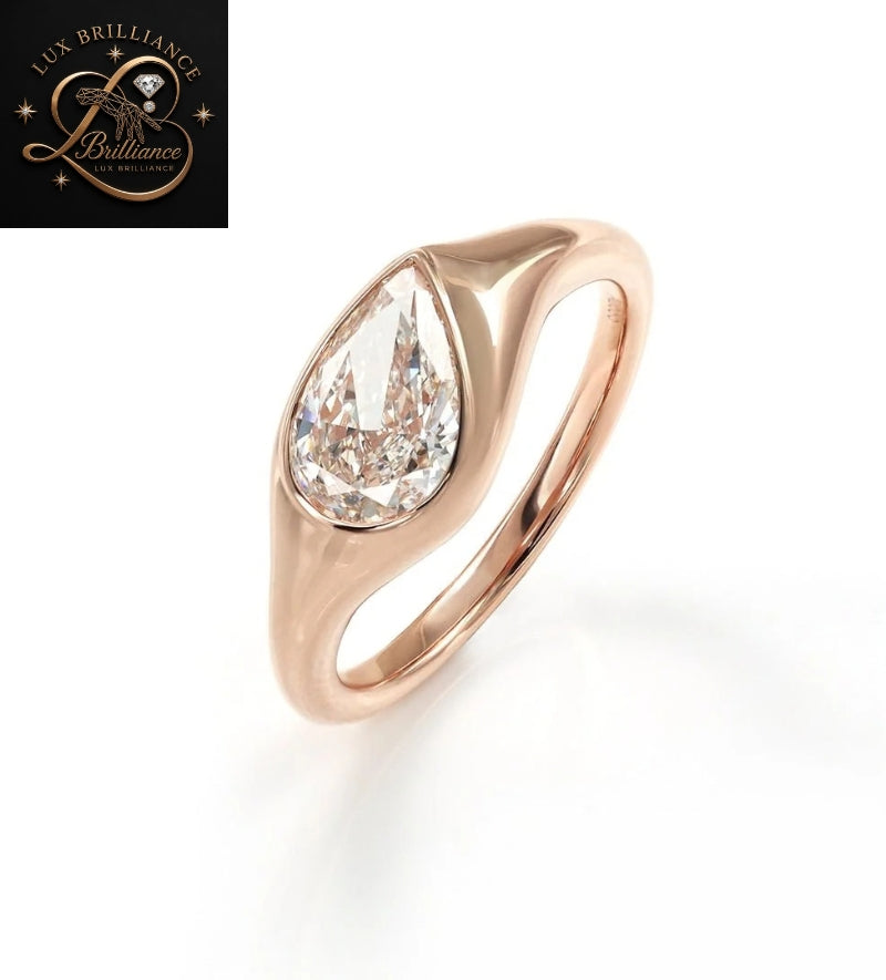 Modern Pear Cut Diamond Flush Bezel Ring in 18K Rose Gold | Anniversary Diamond Ring Gift