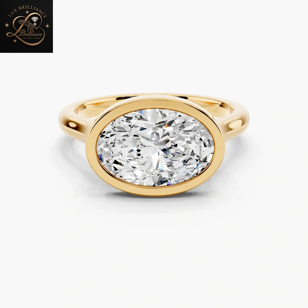 East-West Oval Cut Diamond Bezel Set Solitaire Engagement Ring | 14K Yellow Gold Promise Ring