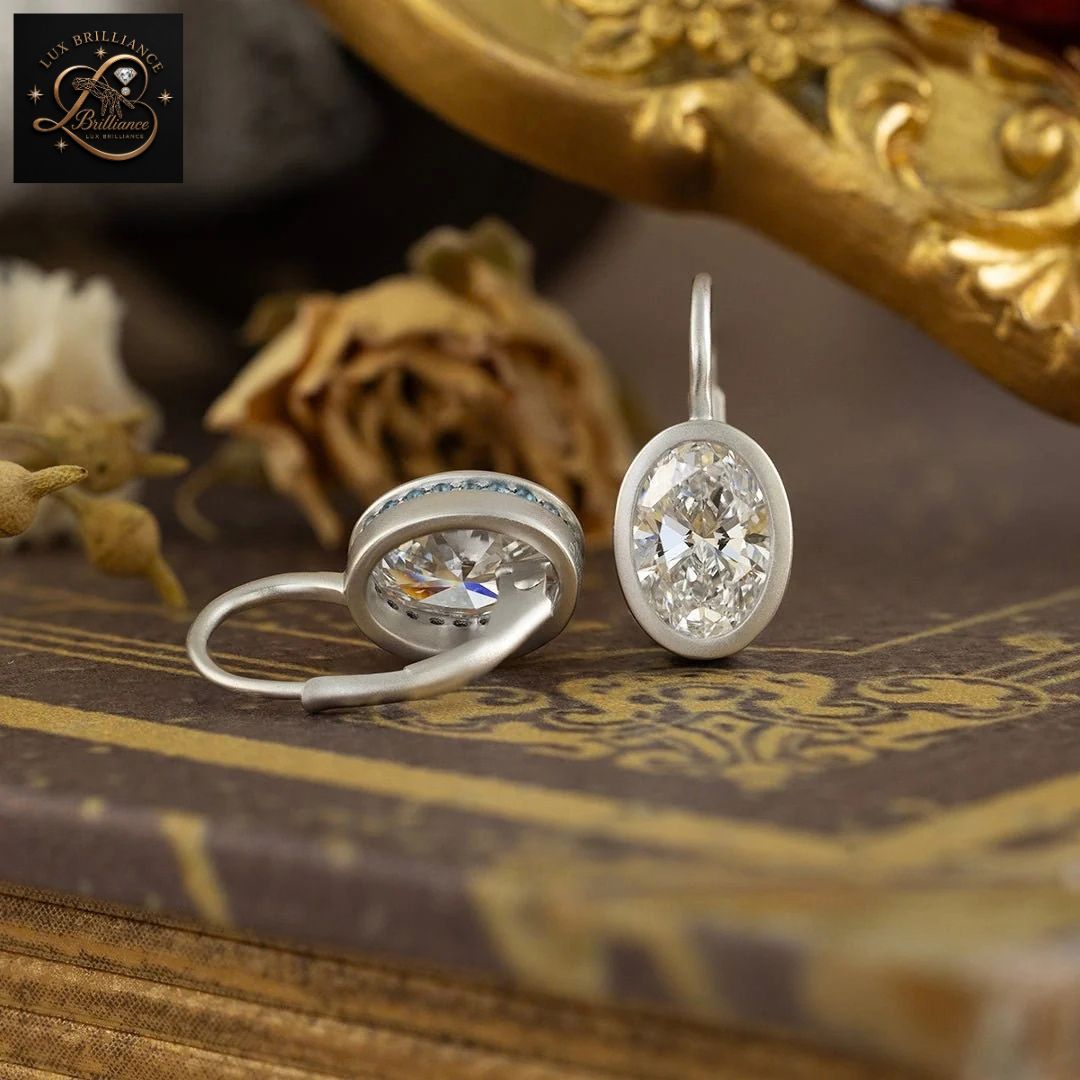 14K White Gold Bezel Oval Diamond Solitaire Earrings | Lever back Dangle