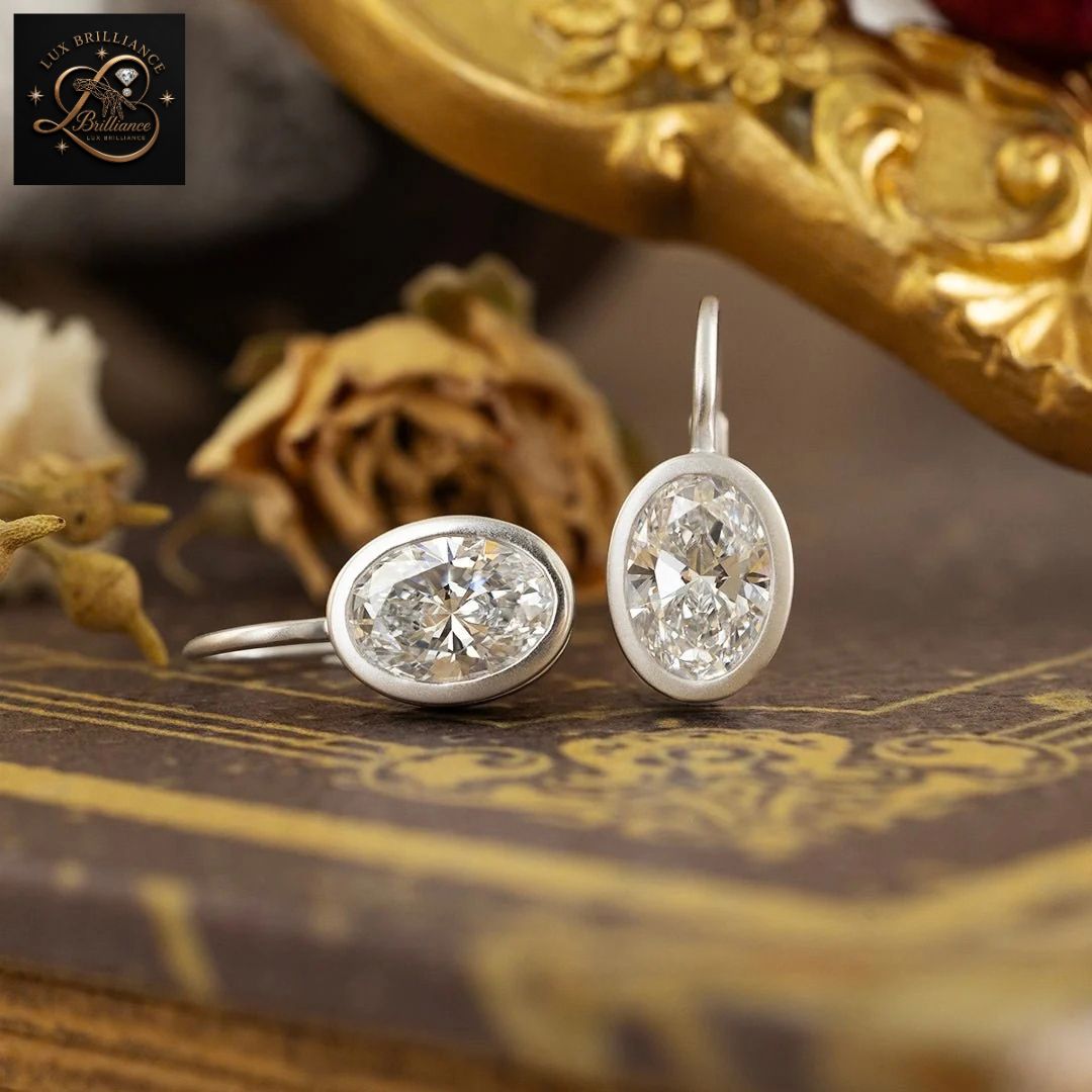 14K White Gold Bezel Oval Diamond Solitaire Earrings | Lever back Dangle