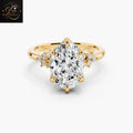 Oval Cut Diamond Bridal Ring with Cluster Accent Shoulders and Tulip Petal Basket
