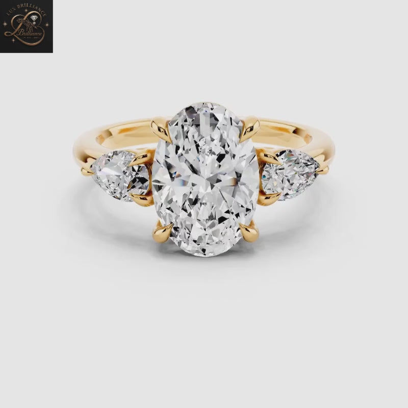 Oval Cut Center Diamond with Pear Side Stones Three-Stone Engagement Ring | Gift For Her