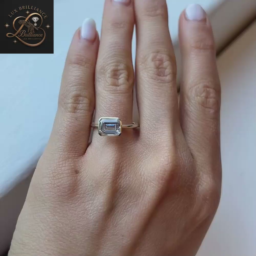 East-West Emerald Cut Diamond Full Bezel Solitaire Ring in Yellow Gold | gift for her