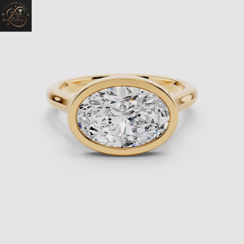 East-West Oval Cut Diamond Bezel Set Solitaire Engagement Ring | 14K Yellow Gold Promise Ring